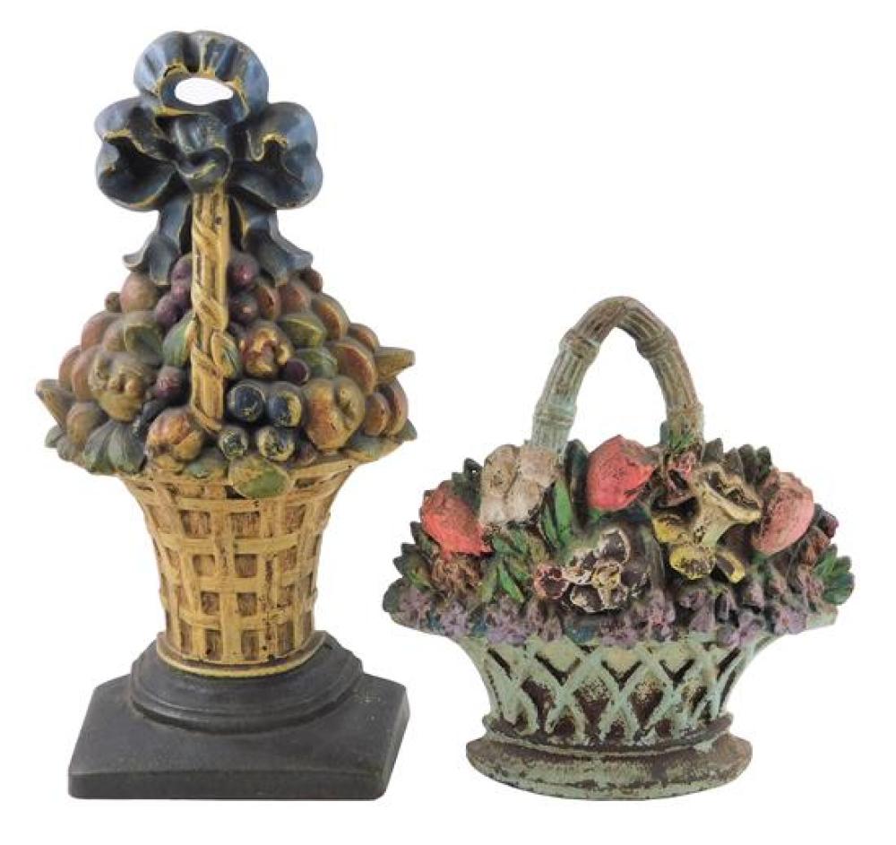 Appraisal: Hubley etc two large cast iron floral basket doorstops with