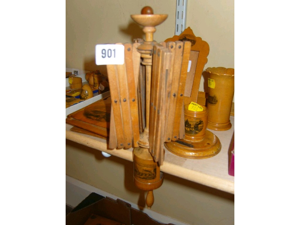 Appraisal: A Mauchline ware wool winder with four concertina branches and