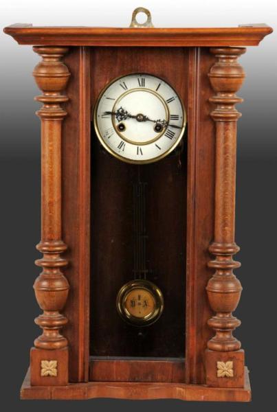 Appraisal: Wooden Time Strike Wall Clock Description Possibly German Includes pendulum