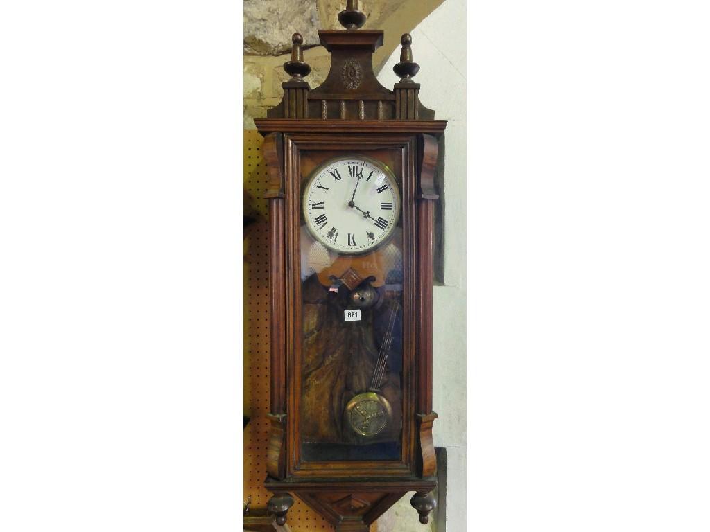 Appraisal: A th century wall clock in the Vienna style with