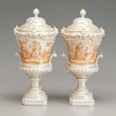 Appraisal: Pair porcelain urns sepia reserves with classical figures swag bellflower