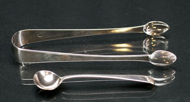 Appraisal: A pair of George III sterling silver sugar tongs London