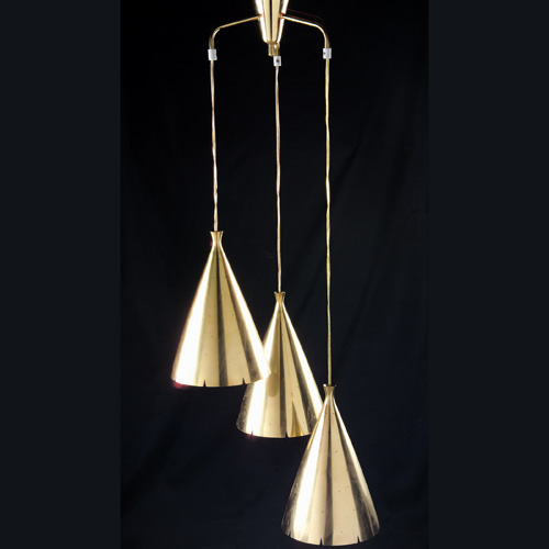 Appraisal: PAAVO TYNEL Fine polished brass chandelier with three perforated conical