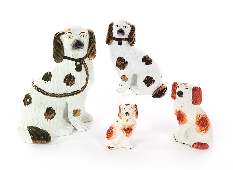 Appraisal: FOUR STAFFORDSHIRE SPANIELS England nd half- th century Two have