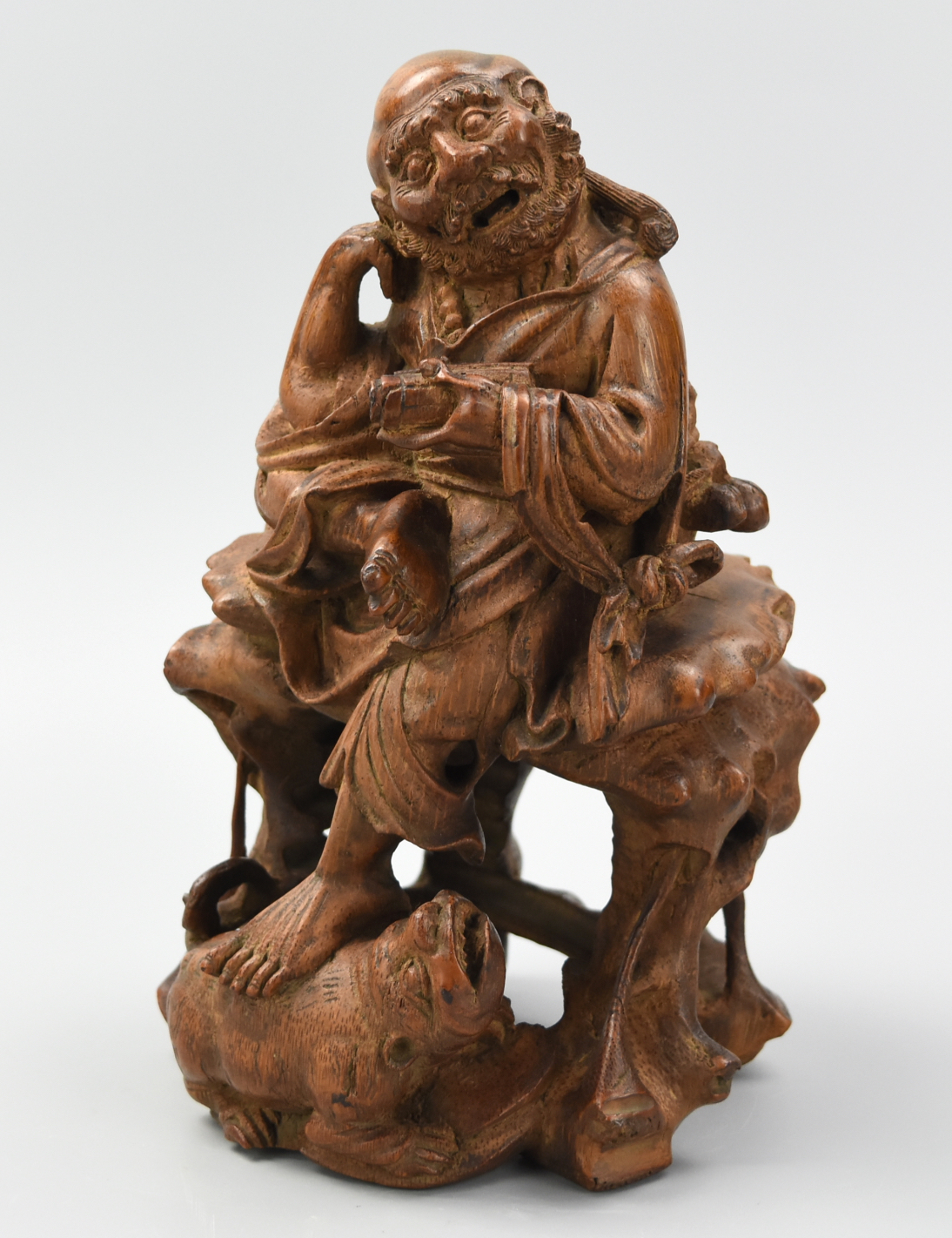 Appraisal: CHINESEE BAMBOO CARVED CONTEMPLATIVE LOHAN TH C An umber colored