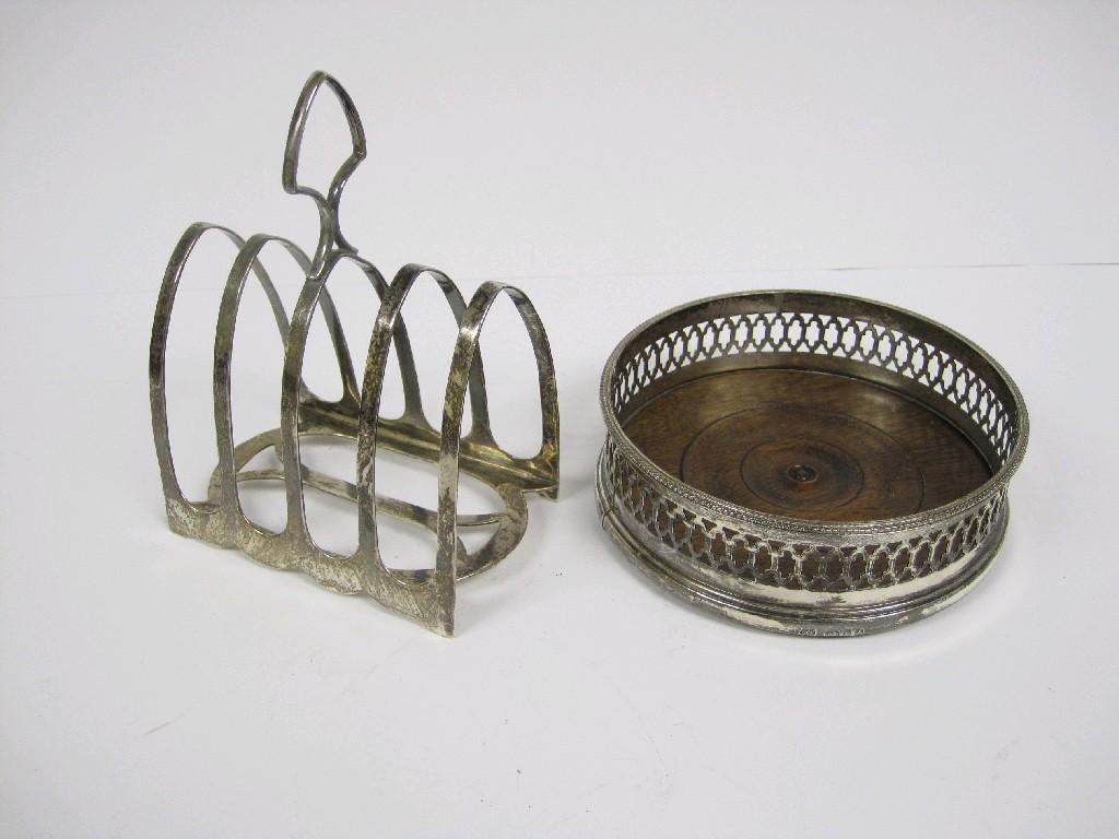 Appraisal: A George V five bar lancet Toastrack Sheffield and pierced