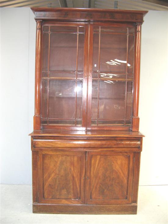 Appraisal: th century mahogany bookcase the top with two glazed doors