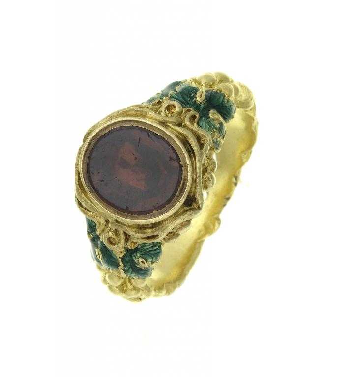 Appraisal: A GOLD AND GREEN ENAMEL SIGNET RING the hoop cast