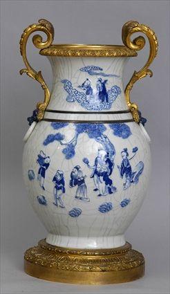 Appraisal: CHINESE BLUE AND WHITE CRACKLE-GLAZED BALUSTER-FORM VASE WITH LOUIS XVI-STYLE