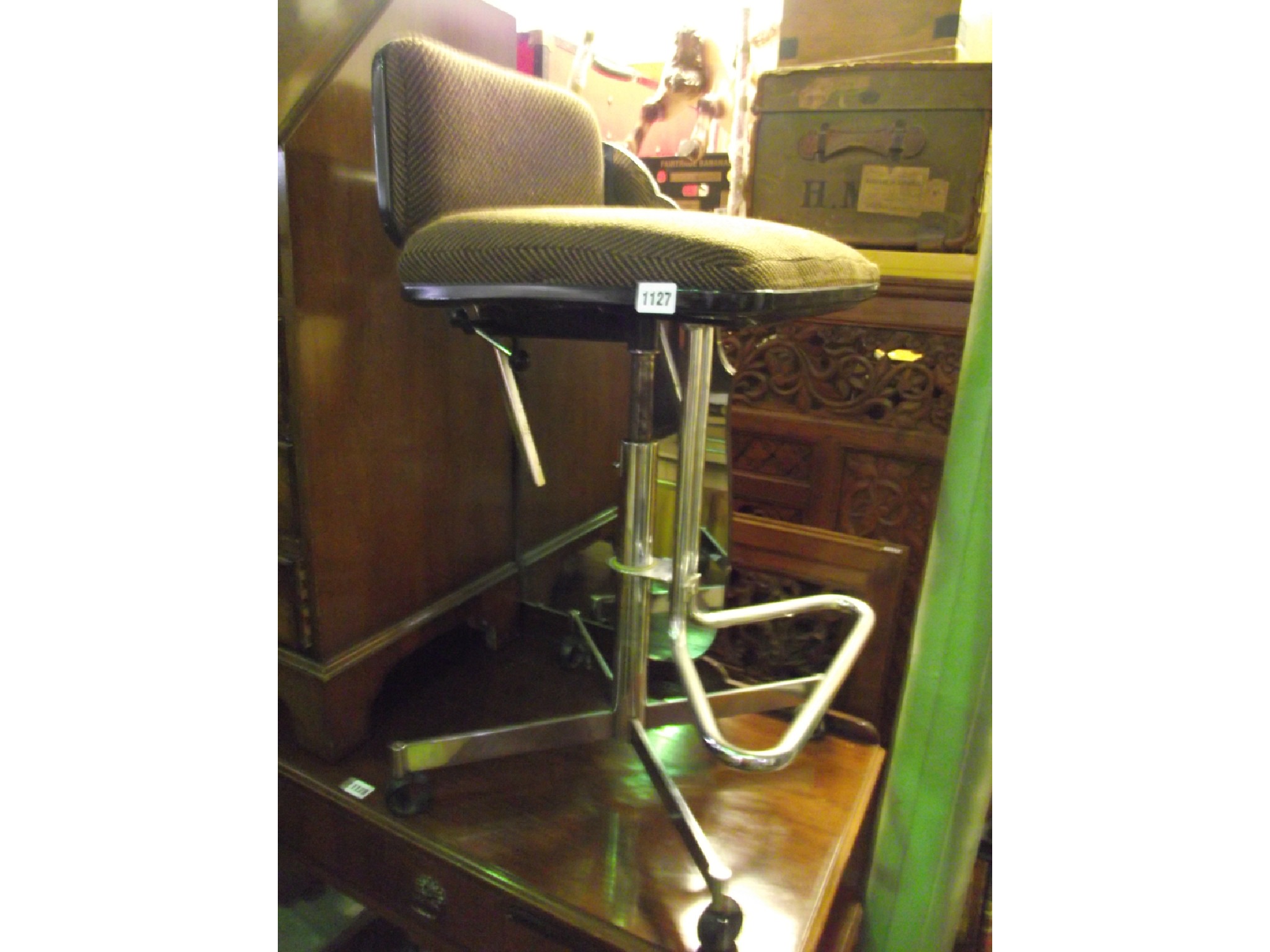 Appraisal: A late th century swivel and height adjustable office chair