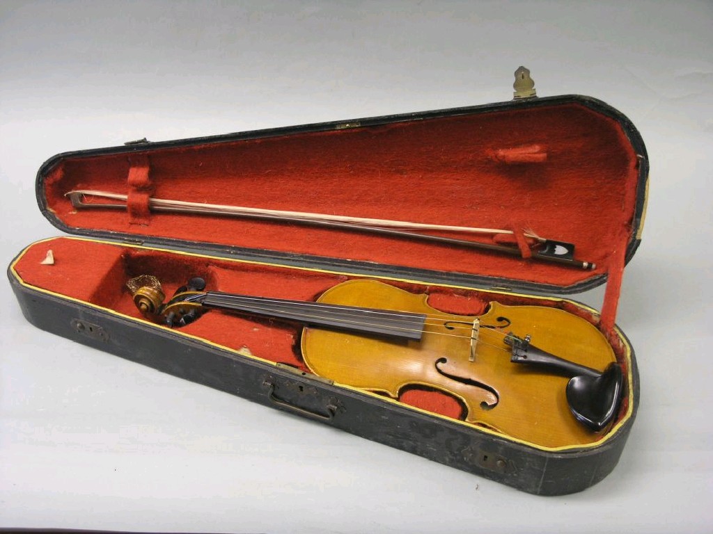 Appraisal: A student's violin in half-veneered back complete with bow both