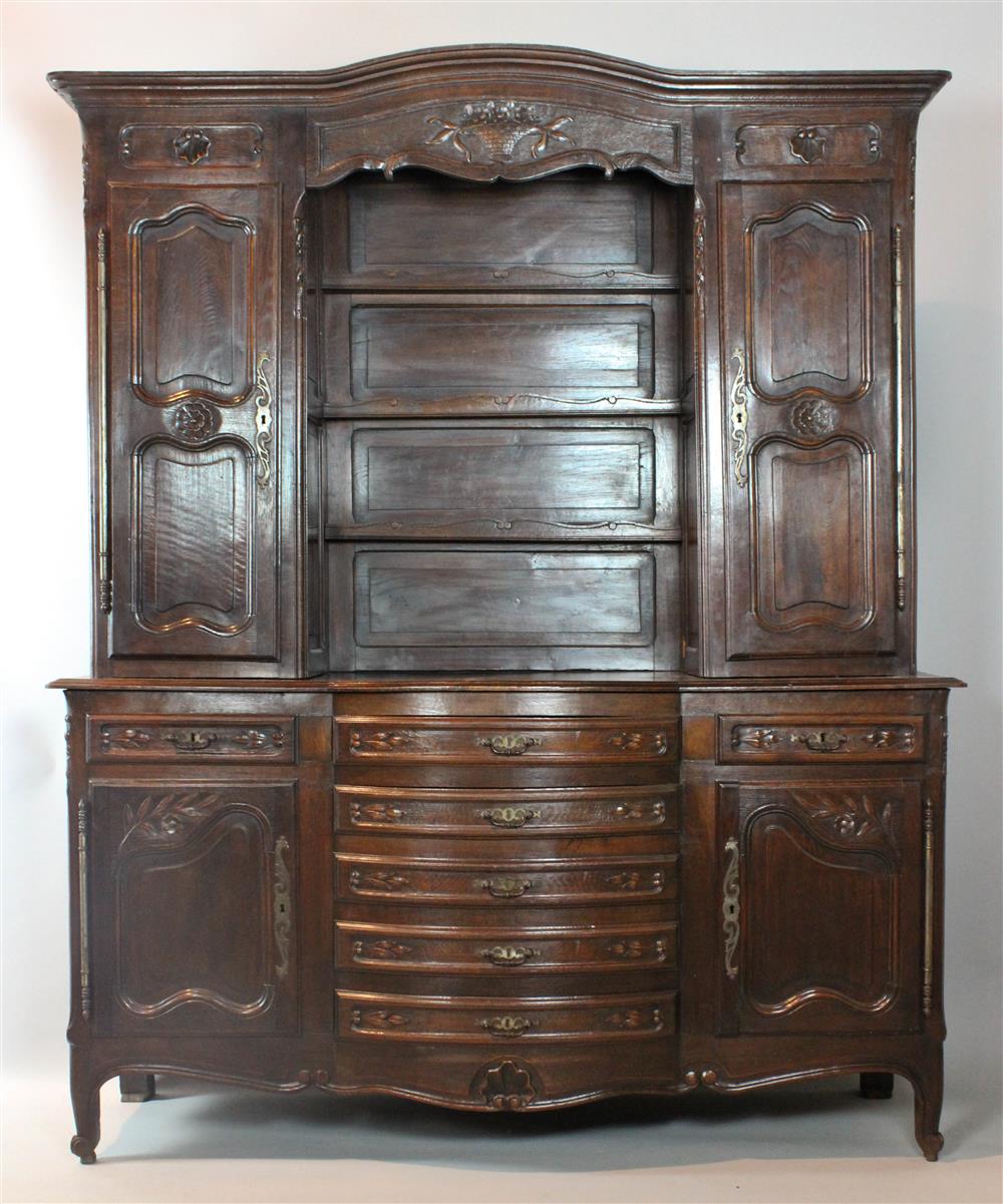 Appraisal: LOUIS XV PROVINCIAL STYLE CARVED OAK BOWFRONT VAISSAILLIER having a