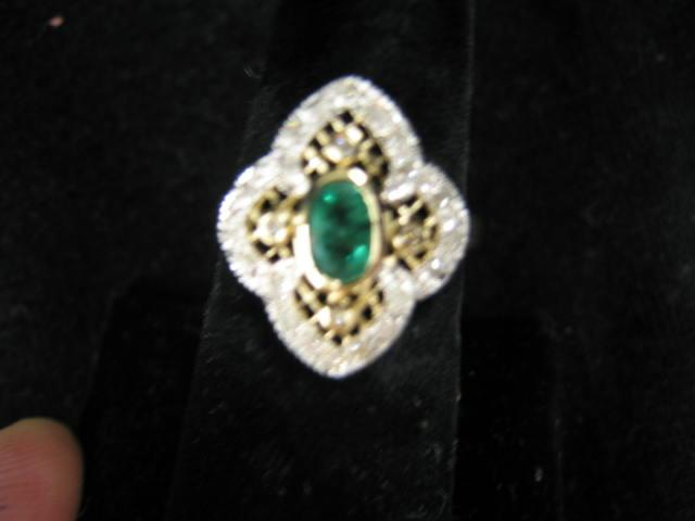 Appraisal: Emerald Diamond Ring oval gem surrounded by diamonds in k