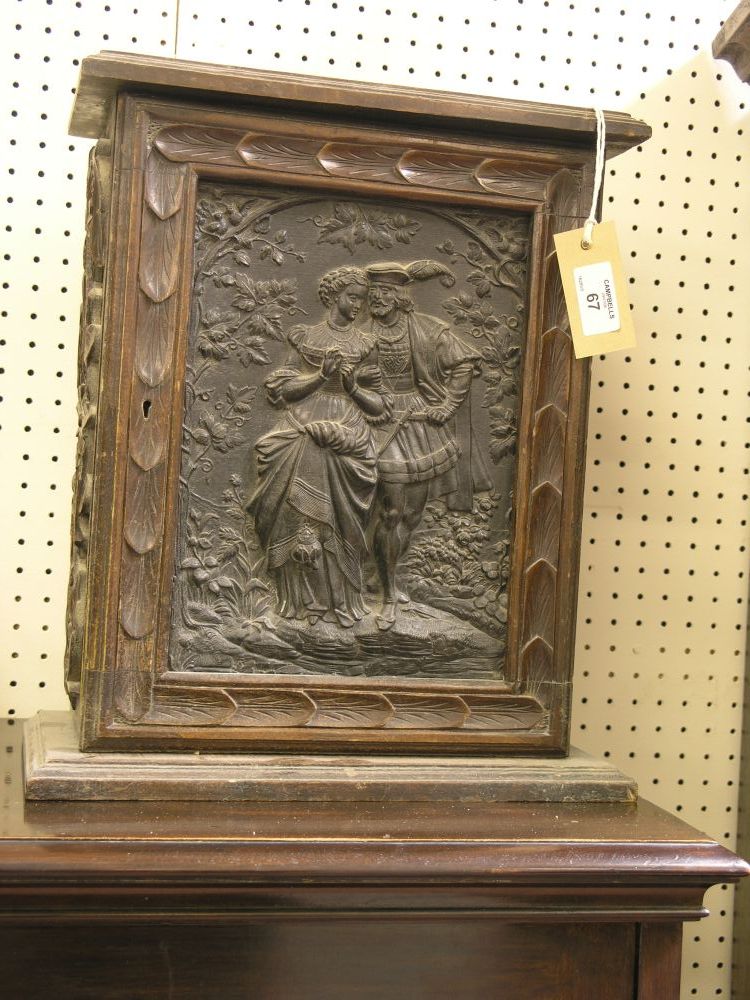 Appraisal: A th century Swiss carved wood wall hanging cupboard arrangement