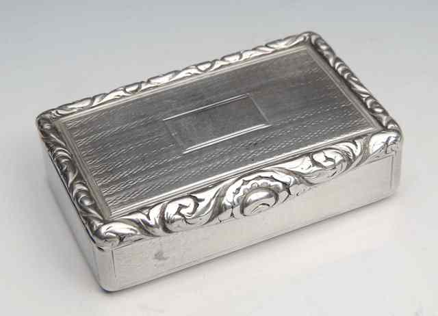 Appraisal: A GEORGE IV SILVER SNUFF BOX the rectangular box with