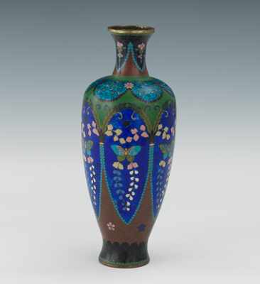 Appraisal: A Cloisonne Vase with Butterflies Vivid multicolor cloisonne decorations throughout