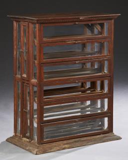 Appraisal: American Carved Oak Ribbon Spool Display Cabinet c each side