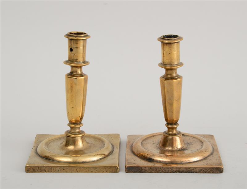 Appraisal: PAIR OF CONTINENTAL BAROQUE BELL METAL CANDLESTICKS POSSIBLY SPANISH Each