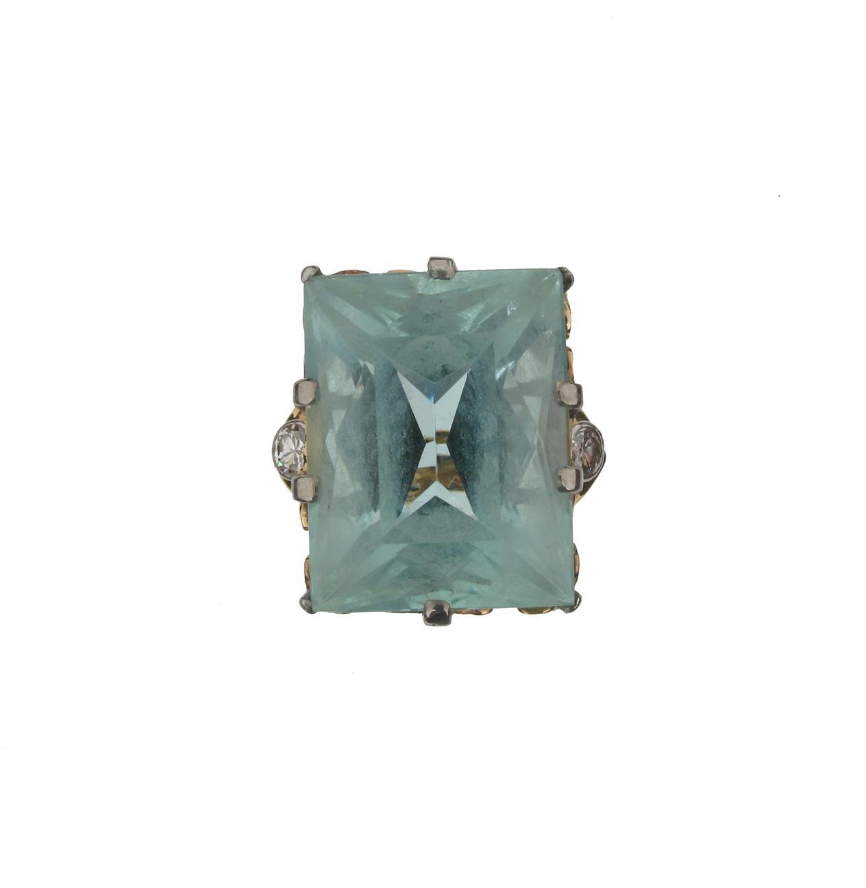 Appraisal: An aquamarine and diamond three stone ring