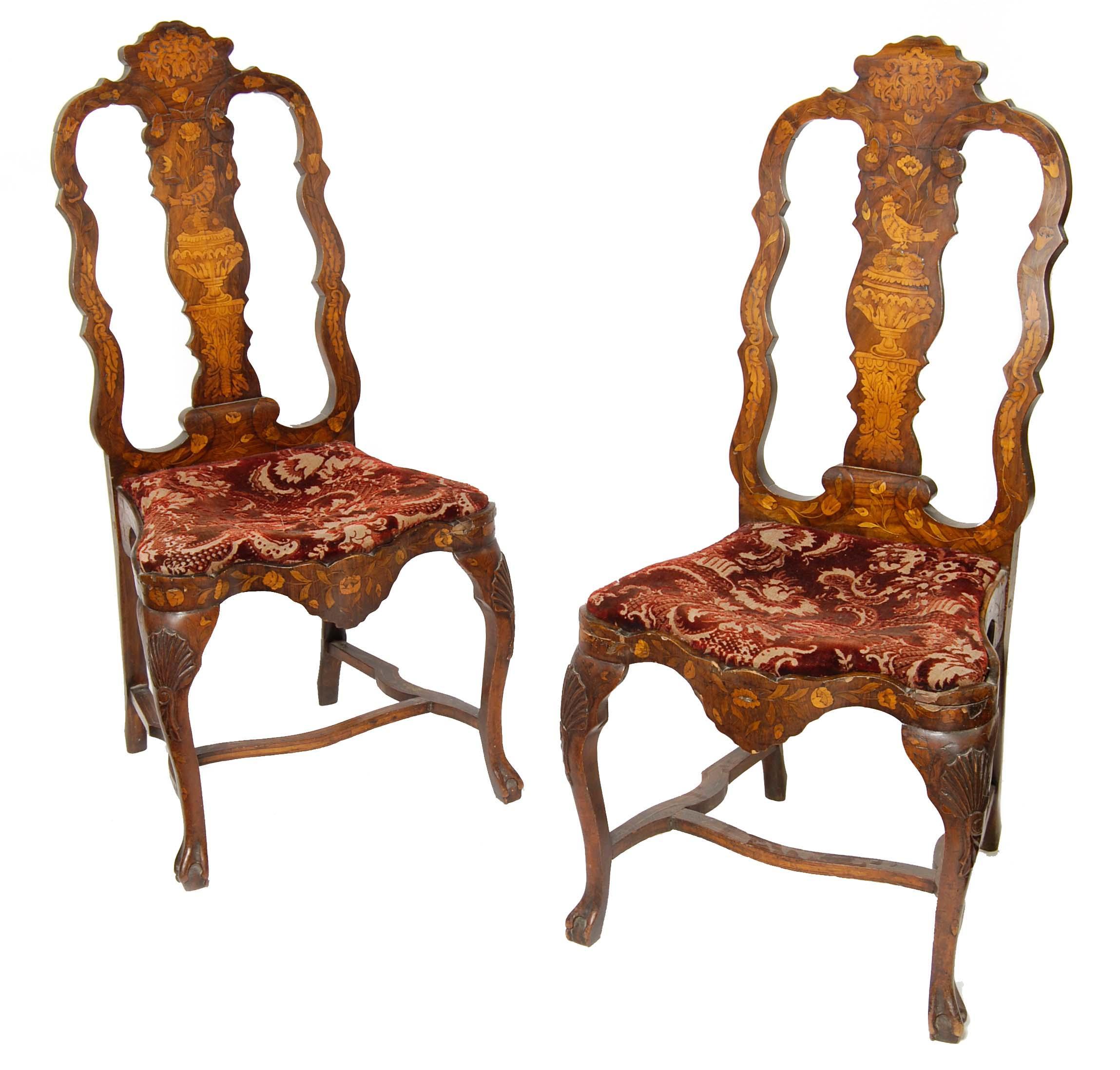 Appraisal: A pair of Dutch marquetry walnut and beechwood side chairs