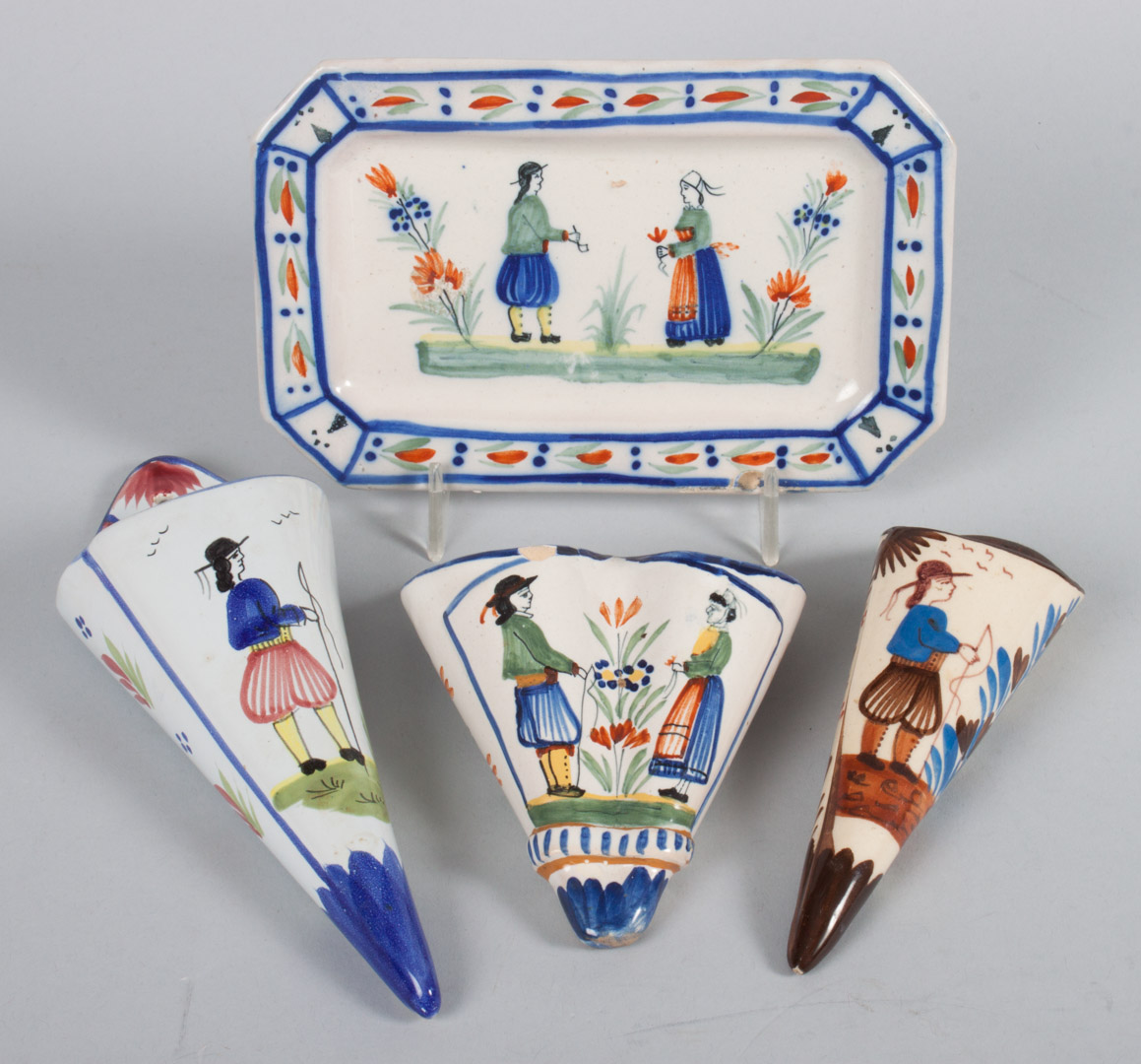 Appraisal: Three Quimper faience wall pockets undertray two Hubaudiere single-pocket wall