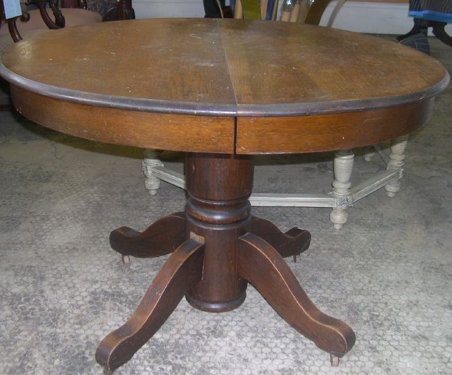 Appraisal: American Late Victorian Oak Circular Dining Table ca the circular