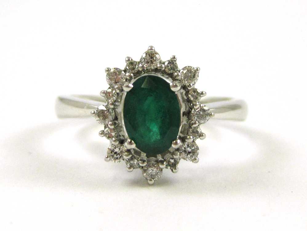 Appraisal: EMERALD DIAMOND AND FOURTEEN KARAT GOLD RING The white gold