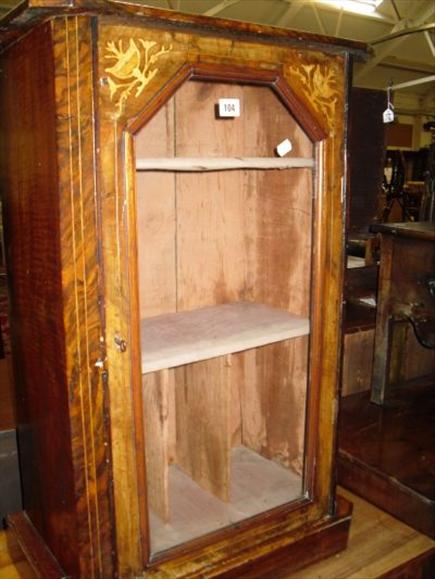 Appraisal: A Victorian inlaid walnut glazed music cabinet with pierced brass