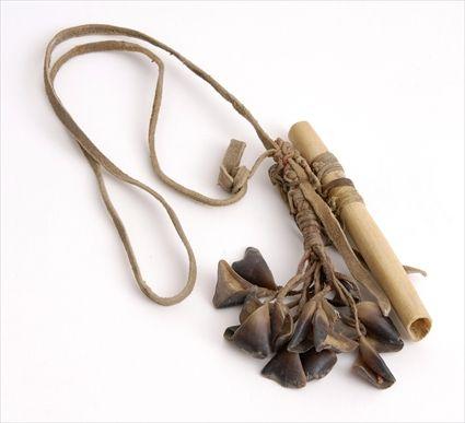 Appraisal: PLAINS BONE FLUTE WITH RATTLES in