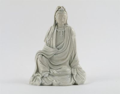 Appraisal: A Chinese blanc de Chine model of Guanyin seated with