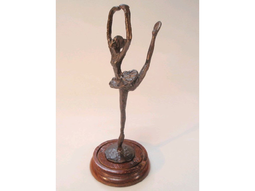 Appraisal: A modern bronze figure of a ballerina on a turned