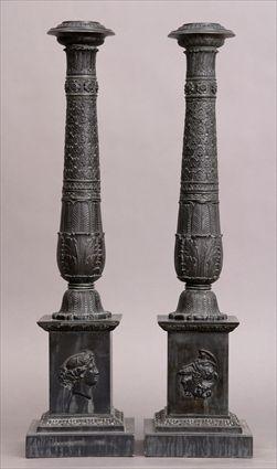 Appraisal: PAIR OF EMPIRE-STYLE BRONZE-PATINATED METAL CANDLESTICK LAMPS Each flared and