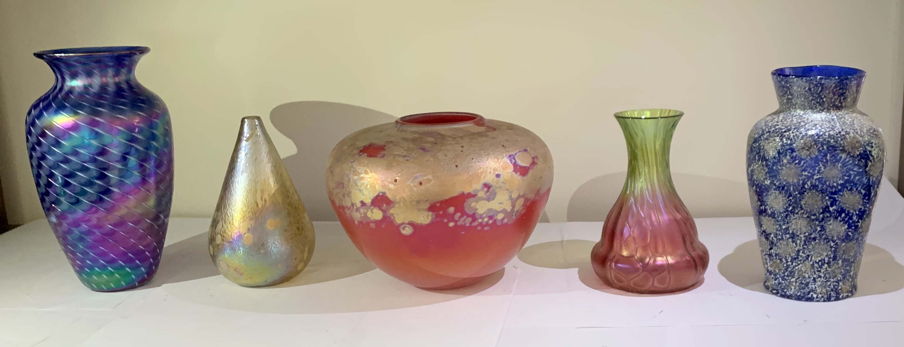 Appraisal: PIECE ART GLASS VASE COLLECTION Comprising Squat vase with iridescent