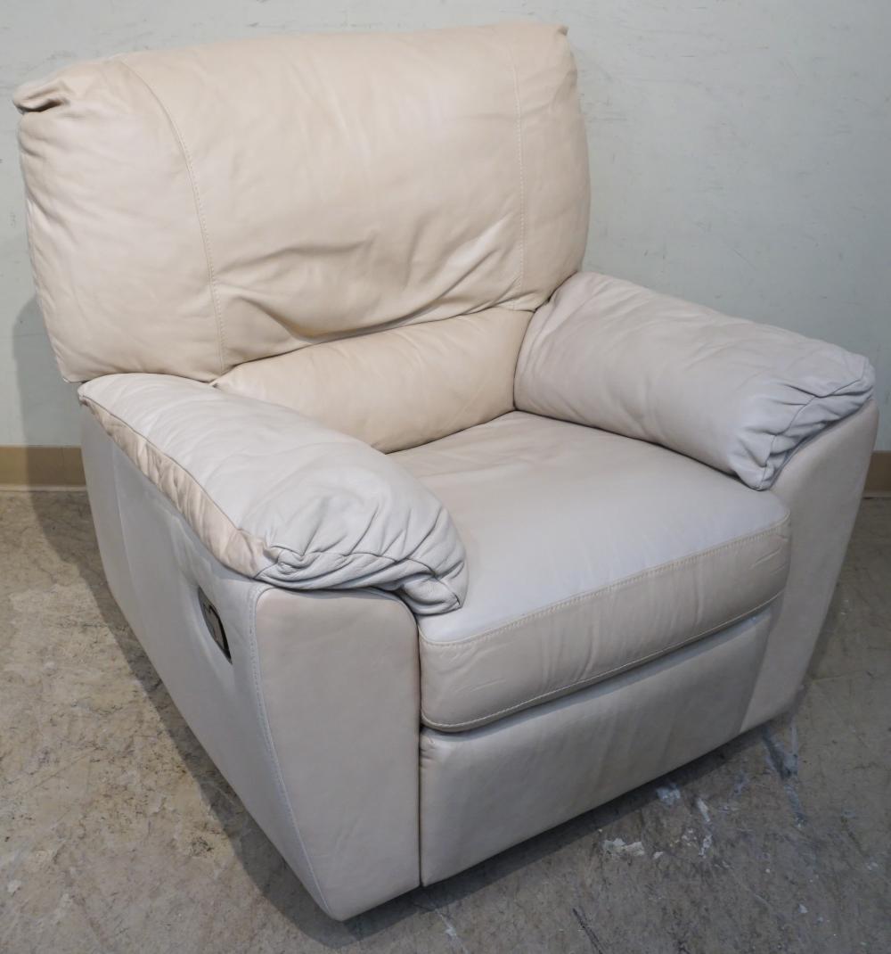 Appraisal: Italian Cream Leather Upholstered Swivel Recliner and an Ottoman