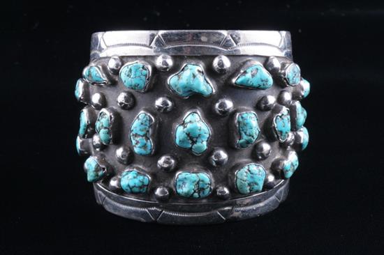 Appraisal: AMERICAN SOUTHWEST INDIAN SLIVER AND TURQUOISE CUFF BRACELET signed J