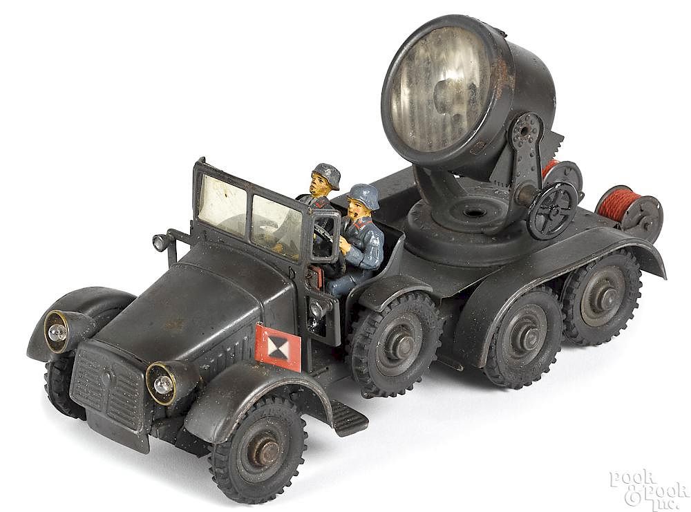 Appraisal: Hausser painted tin clockwork search light truck Hausser painted tin