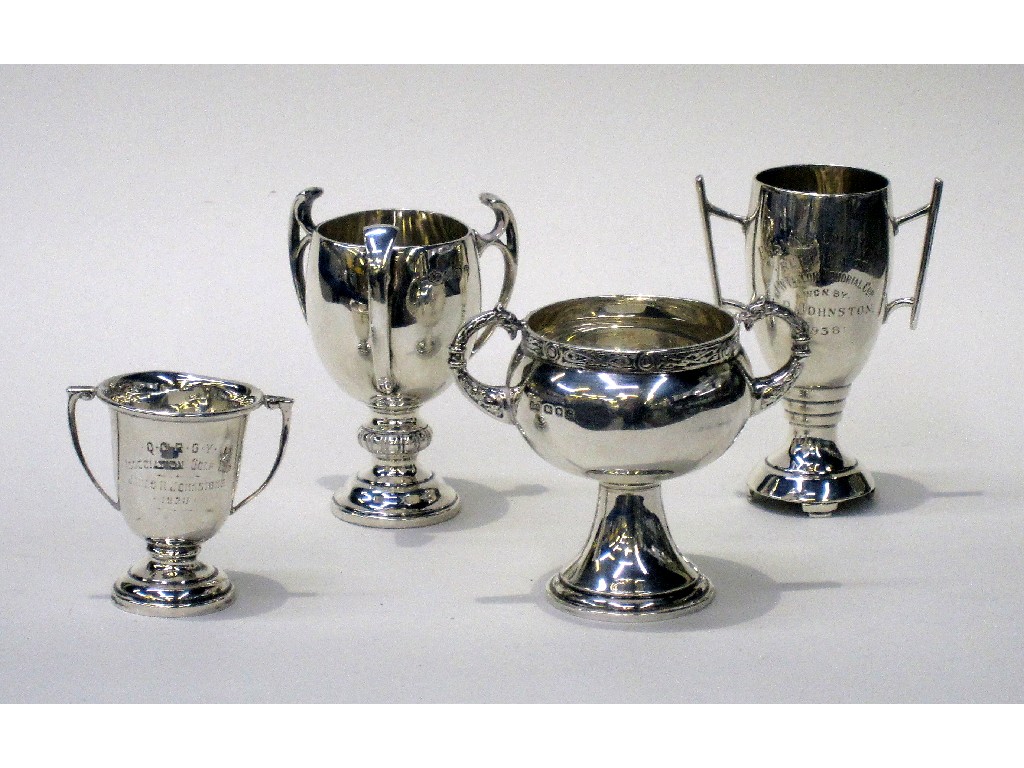 Appraisal: Lot comprising four silver trophy cups assorted marks