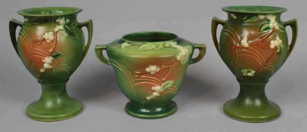 Appraisal: PAIR ROSEVILLE POTTERY GREEN SNOWBERRY FOOTED VASES urn form with