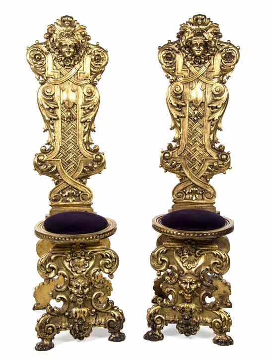 Appraisal: A Pair of Renaissance Revival Giltwood Hall Chairs each having