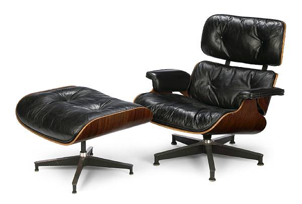 Appraisal: A Charles and Ray Eames walnut and leather lounge chair