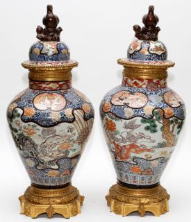 Appraisal: CHINESE PORCELAIN COVERED URNS W BRONZE MOUNTS CHINESE PORCELAIN COVERED