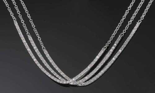 Appraisal: BRILLIANT-CUT DIAMOND NECKLACE White gold Modern decorative necklace consisting of