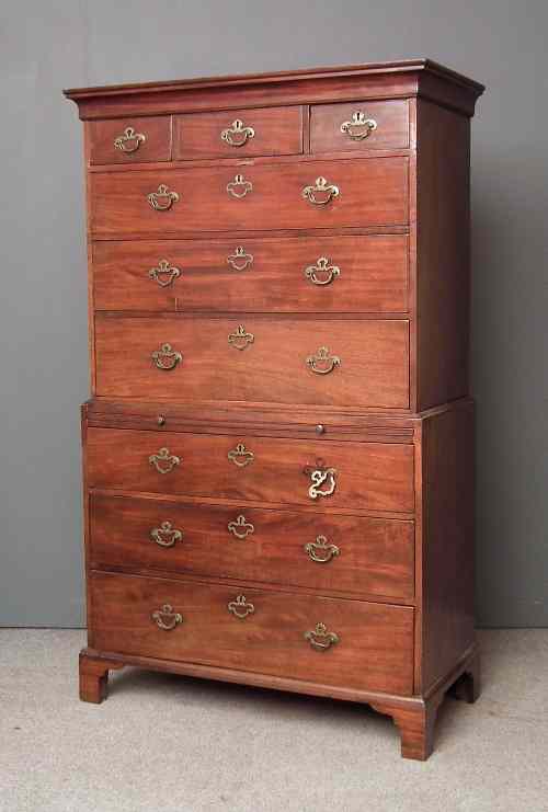 Appraisal: A George III mahogany tallboy with moulded cornice fitted three