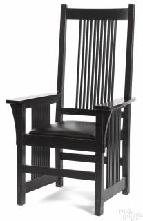 Appraisal: Gustav Stickley tall spindle back oak armchair with an ebonized