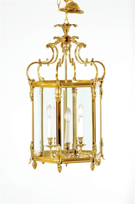 Appraisal: Hexagonal brass hall chandelier brass frame retaining beveled glass panels