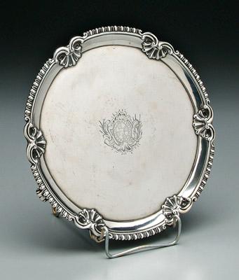 Appraisal: George II English silver salver round with three scroll feet