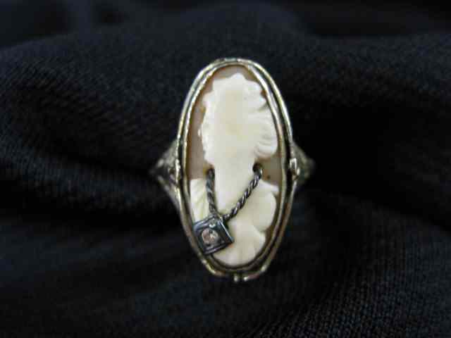 Appraisal: Cameo ''Flip'' Ring diamond black onyx on one side portrait