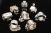 Appraisal: FIGURAL SILVER PLATE NAPKIN RINGS - Including Pair of simple