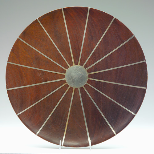 Appraisal: PAUL EVANS PHILLIP LLOYD POWELL Walnut charger with radiating pewter