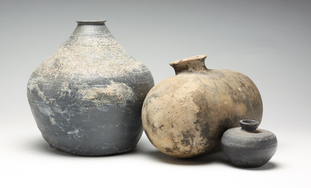 Appraisal: THREE KOREAN POTTERY VESSELS Possibly rd- th century One with